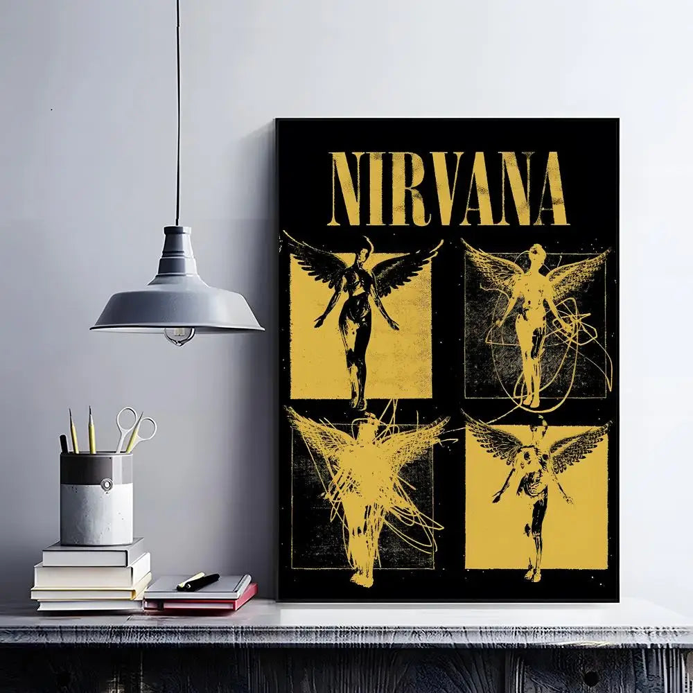 A black poster featuring the word NIRVANA in gold text and four silhouettes of winged figures on a yellow background.