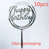A set of ten gold acrylic happy birthday cake toppers with the words happy birthday on a stick.