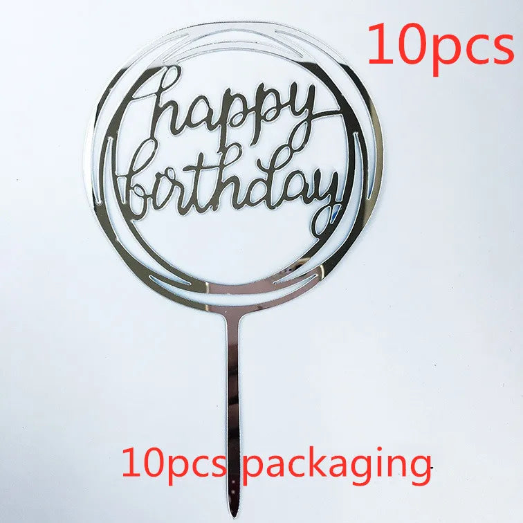 A set of ten gold acrylic happy birthday cake toppers with the words happy birthday on a stick.