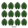 Twelve artificial tropical palm leaves in various shades of green arranged in a grid.