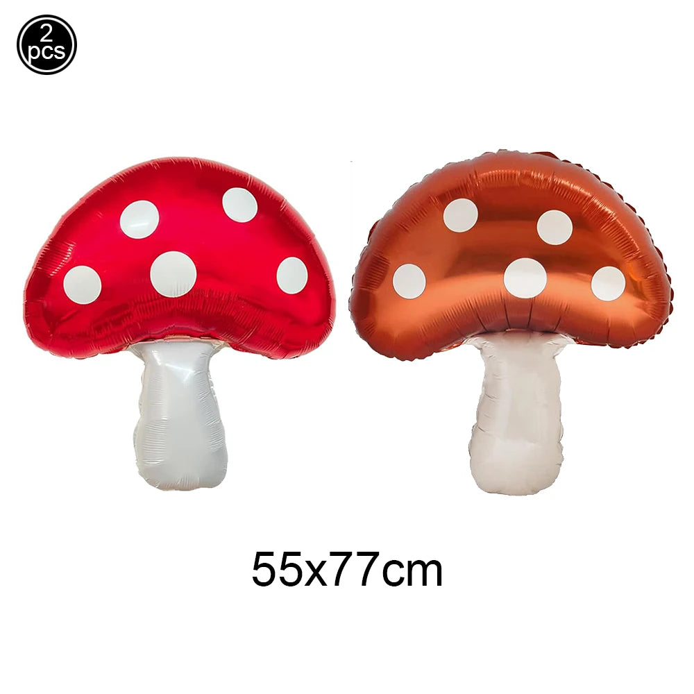 Two inflatable mushroom decorations, one red and one copper, with white polka dots.