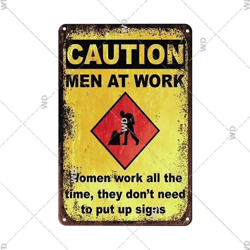 A vintage yellow metal sign with black text warning men at work and a statement about women working all the time.