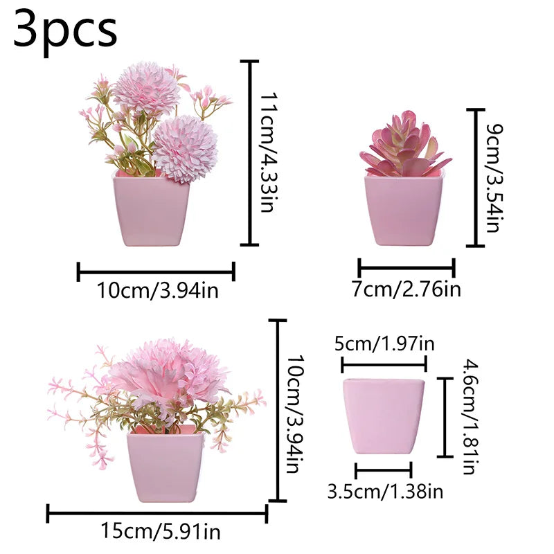 Three pink faux bonsai plants in small pots displayed side by side.