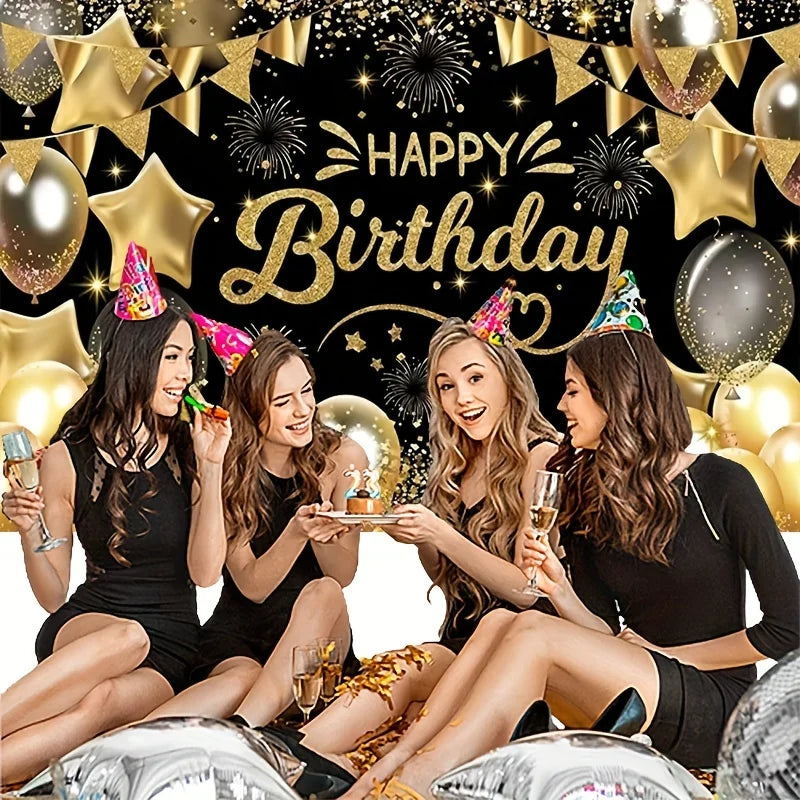 Five young women smiling and celebrating in front of a black and gold birthday party backdrop with balloons and confetti.