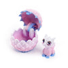 A pink dragon egg is cracked open, revealing a small, light purple dragon toy inside.