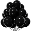 A bunch of black latex balloons clustered together.