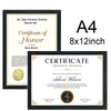 A certificate of honor and employee of the month framed in black and gold for display