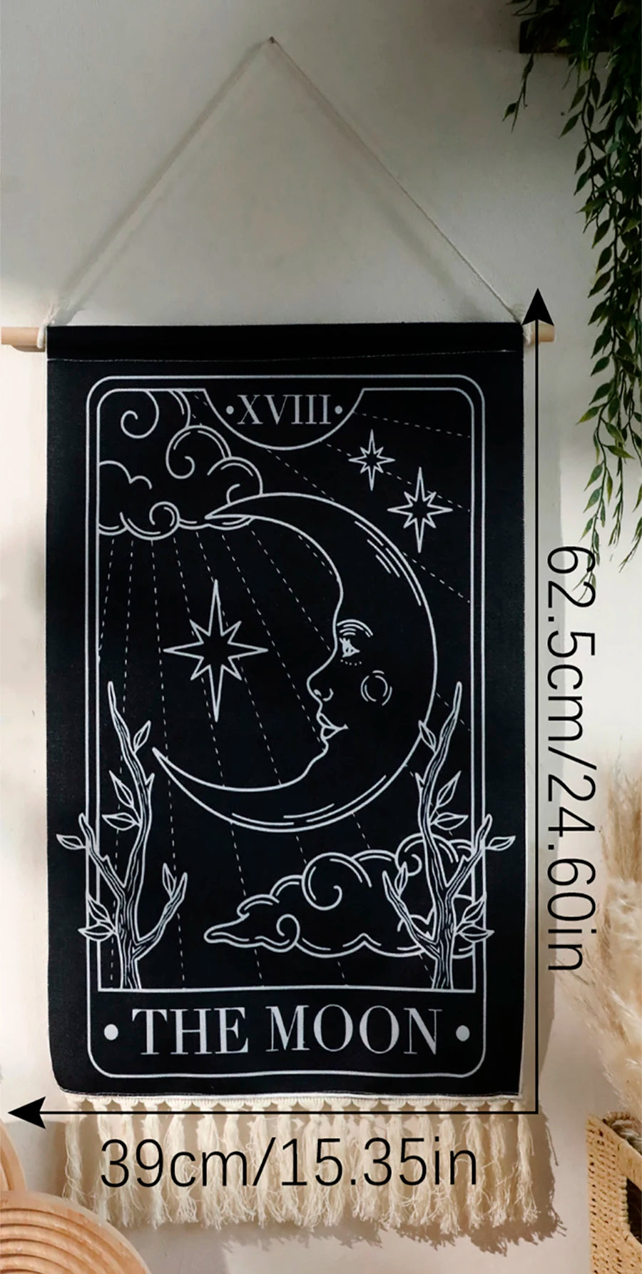 Black sun and moon boho wall tapestry featuring a line drawing of the moon and stars