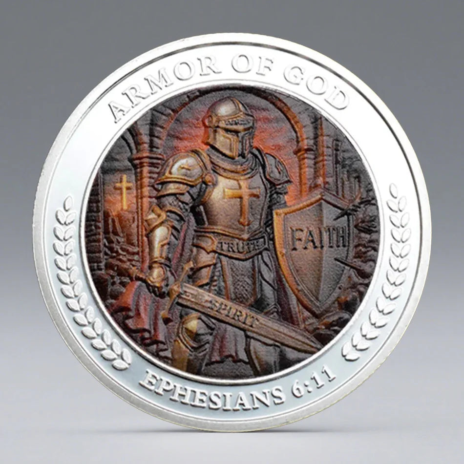 A round coin featuring a gold-plated knight and armor, with the inscription Ephesians 6:11 on the edge.