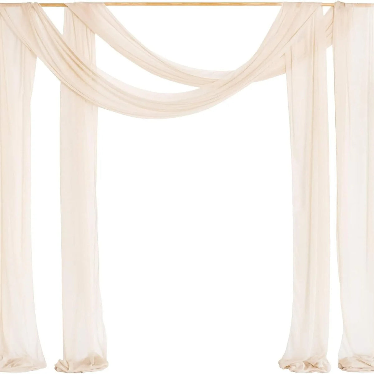 Elegant cream chiffon arch drapes forming a backdrop for weddings and events