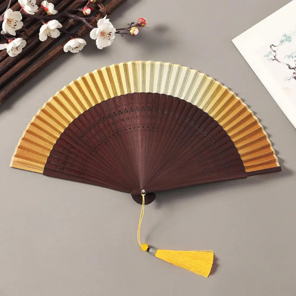 Traditional Bamboo Folding Fan with Solid Color Design