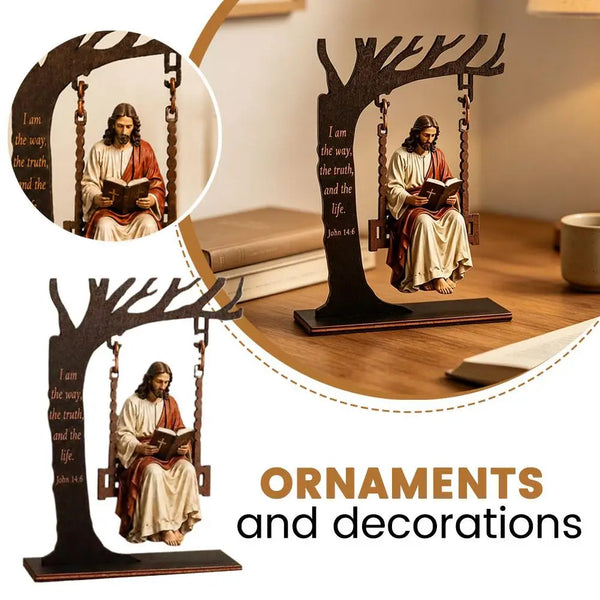 Wooden ornament depicting Jesus reading the Bible in a hanging frame on a desk.
