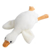 A white plush duck toy with orange accents, shaped like a duck, used as a keychain or pendant.