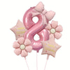 Pink foil balloons shaped like the number 8 and a flower, used for birthday celebrations.