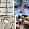 Artificial green climbing vine used as home decor in various packaging and floral arrangements.