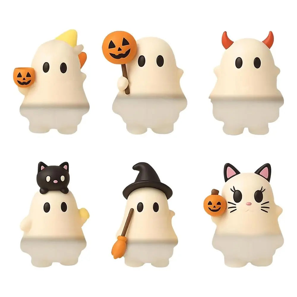 A set of four peel-and-stick ghost phone decoration charms featuring Halloween and cat faces.