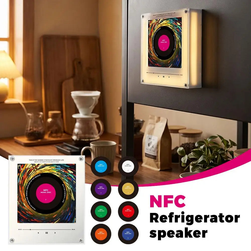 A white NFC refrigerator speaker with a rotating disc display mounted on a dark surface.