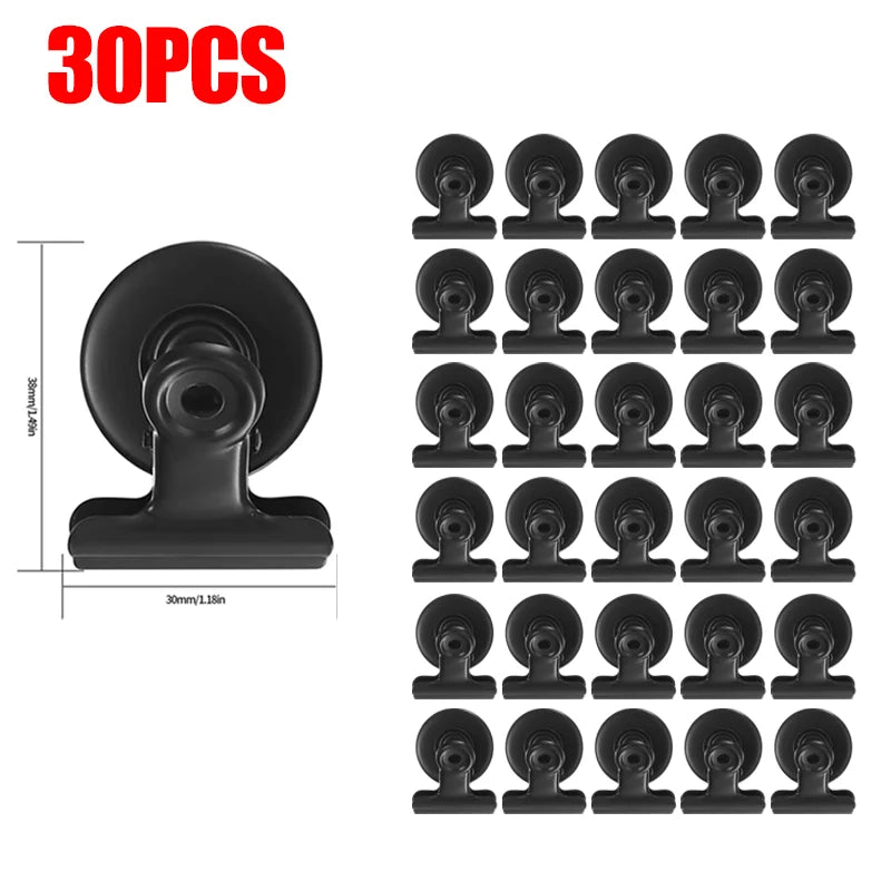 30 pieces of heavy duty black fridge magnetic clips shown in a row.