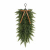 Artificial Christmas teardrop swag made of green Norfolk pine needles with a wooden hanger