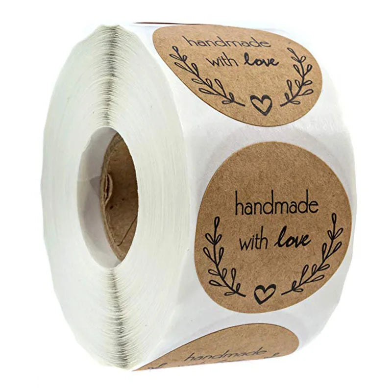Roll of white kraft paper with handmade with love stickers on the label