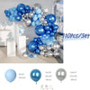 A set of blue and silver balloons forming an arch for party decorations