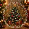A round clear acrylic ornament featuring a detailed Christmas tree decorated with pearls, glitter, and gold accents.