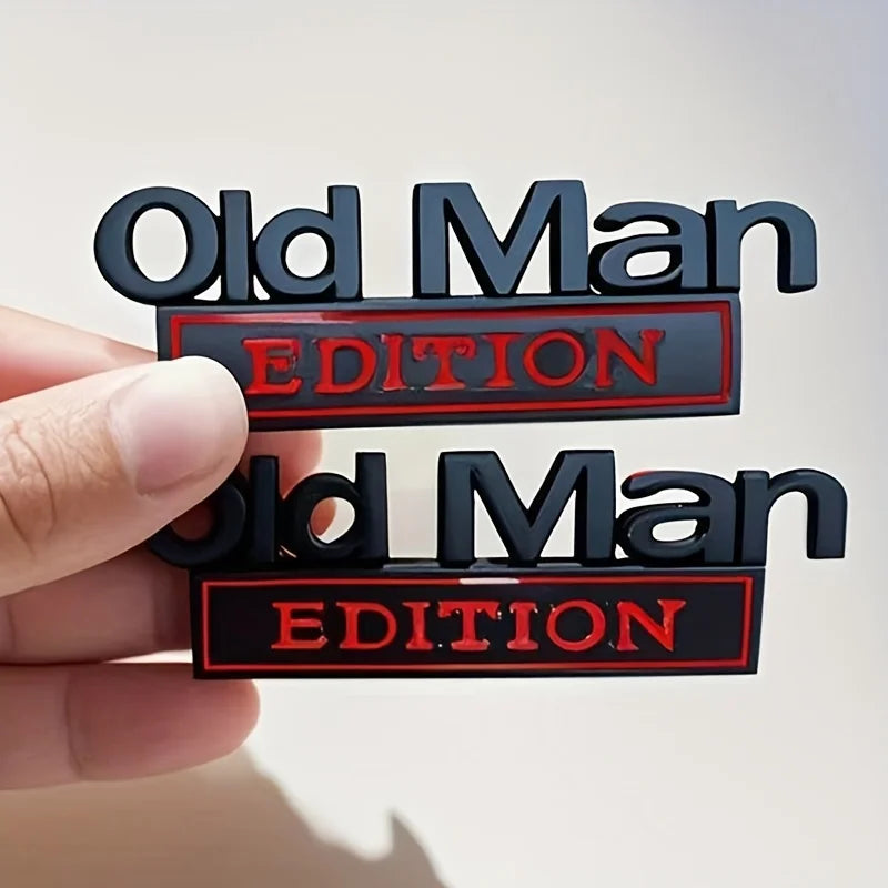 Two black and red emblems for car door decoration featuring the text Old Man Edition