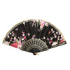 A vintage lace hand fan featuring black fabric with pink and purple floral embroidery.