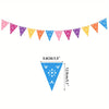 A string of colorful felt papel picado banners in various shades of pink, yellow, and blue triangles.