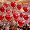 A set of red heart-shaped foil balloons and clear bubble balloons for a birthday or party decoration.
