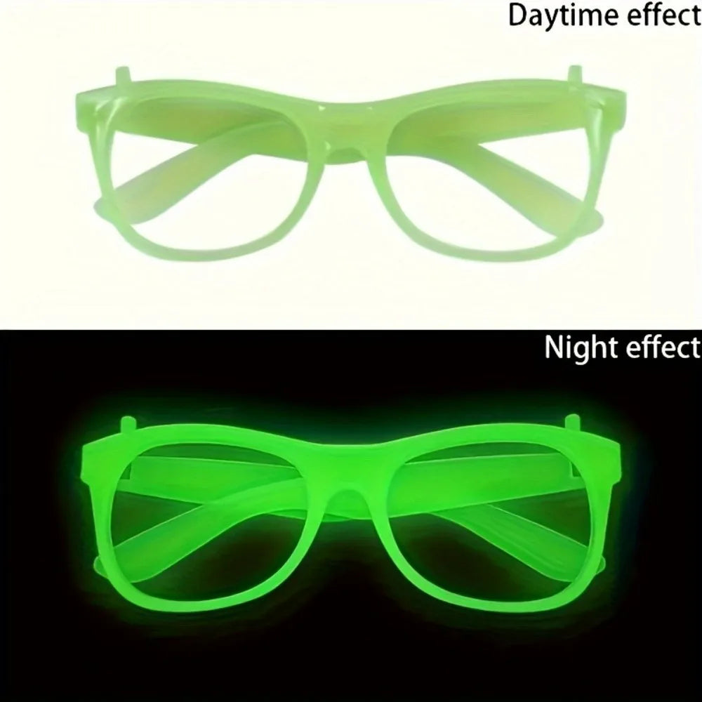Pair of neon green glow in the dark party glasses shown under daytime and night light conditions.