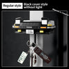 Black cover style headlight key holder with a brass key attached