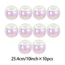 A set of ten iridescent pink and purple foil party balloons.