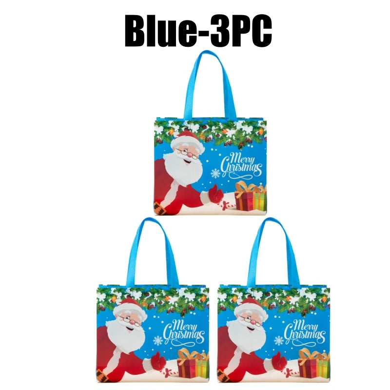 Blue 3PC set of festive Christmas gift bags with handles featuring Santa Claus designs