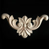 A set of four wooden carved corner appliques used for furniture and frame decoration.