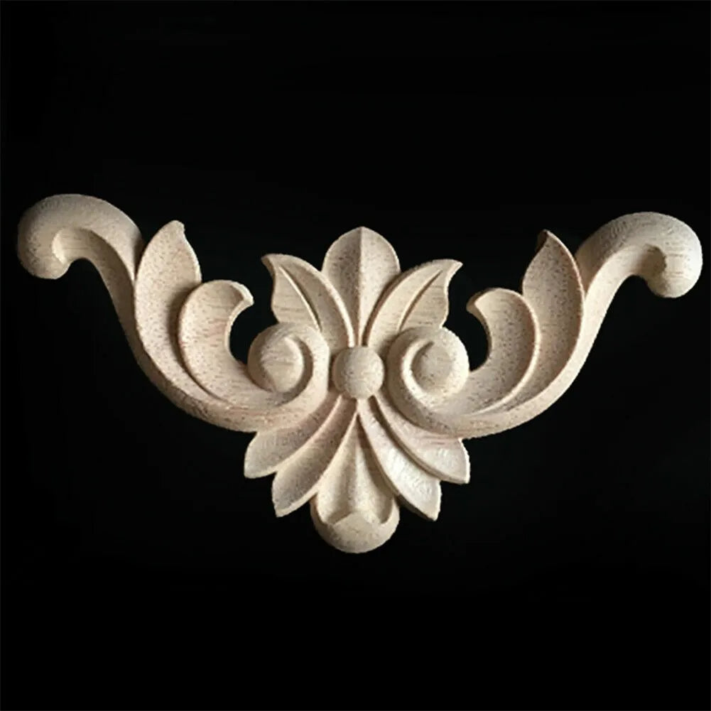 A set of four wooden carved corner appliques used for furniture and frame decoration.