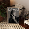 A canvas print featuring a black and white photo of a person with their hand covering their face.