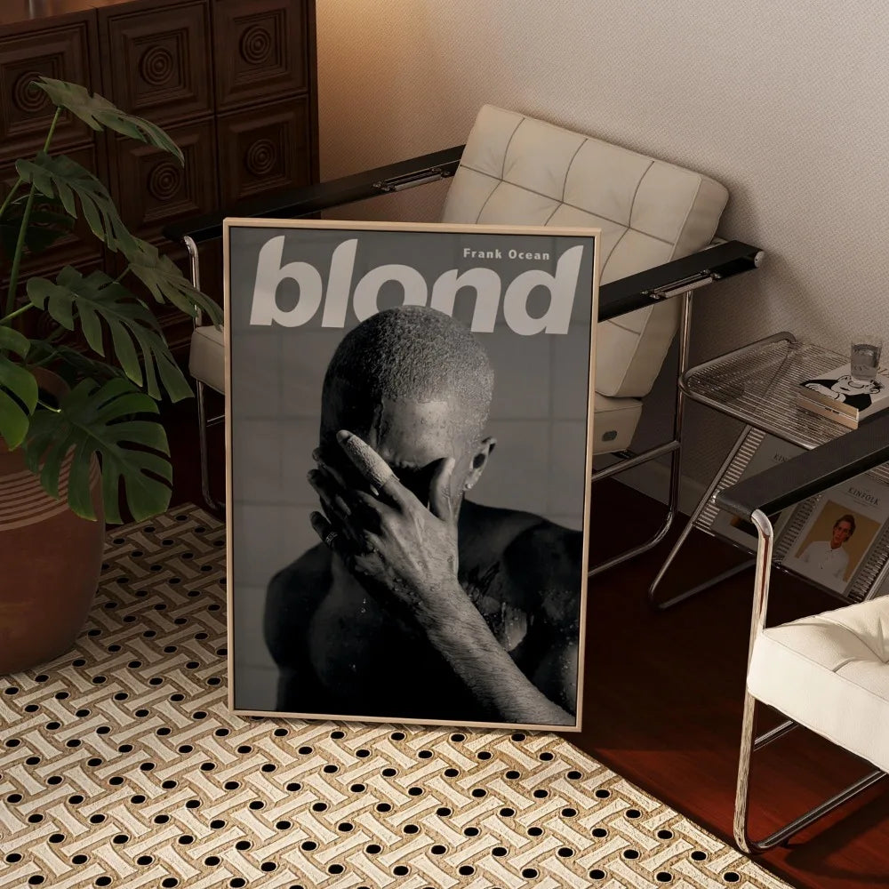 A canvas print featuring a black and white photo of a person with their hand covering their face.
