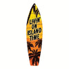 A vertical wooden sign shaped like a surfboard featuring palm trees and the text LIVING ON ISLAND TIME.