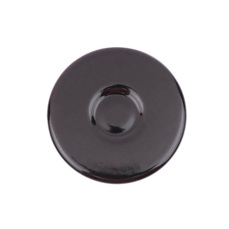 A round, dark brown gas stove burner cap.