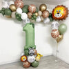 A balloon arch kit featuring sage green number balloons and various animal-themed balloons for a safari jungle birthday decor