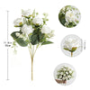 A bouquet of white silk touch artificial roses with green leaves and small white filler flowers.
