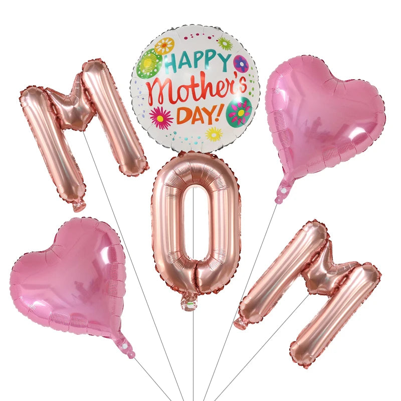 A set of pink foil balloons including a heart shape, the number zero, and a round balloon with Happy Mother's Day text.
