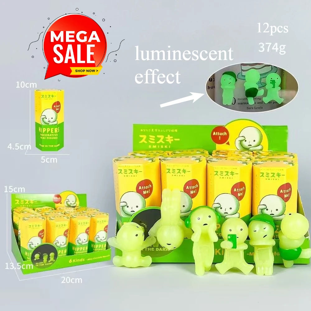 A set of 12 glow-in-the-dark anime animal blind box figures in yellow and green packaging.
