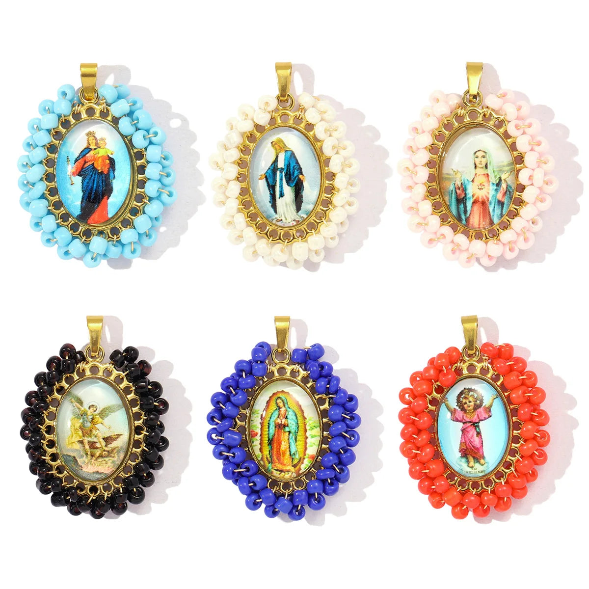 A set of six French stainless steel Virgin Mary charm pendants featuring various colors and floral borders.