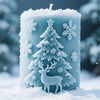 A light blue silicone mold shaped like a reindeer and Christmas tree covered in snow, resting on white snow.