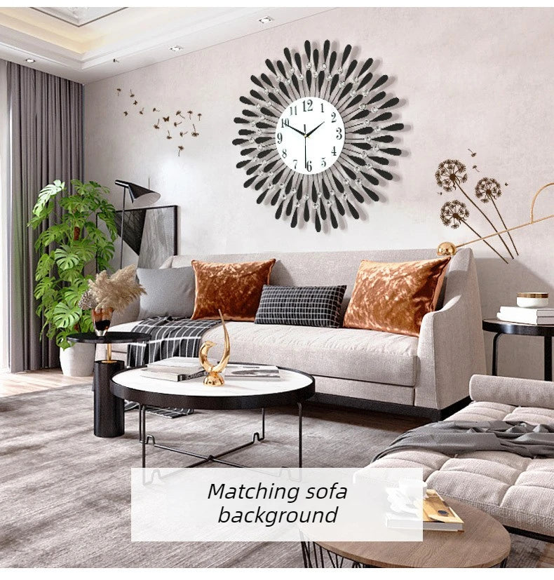 A modern minimalist metal wall clock with radiating spikes hangs above a light gray sofa in a contemporary living room.