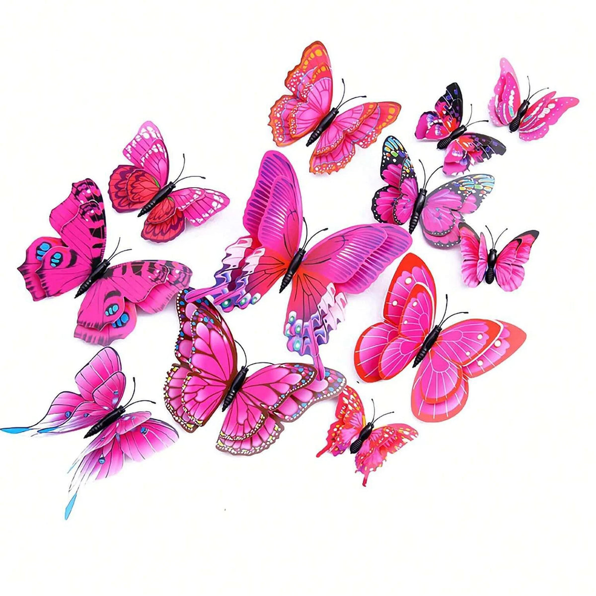 A collection of twelve vibrant pink and orange 3D magnetic butterfly wall decor pieces.