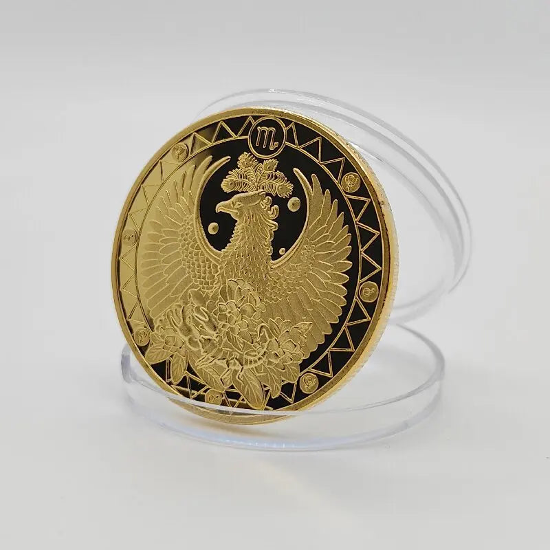 A round gold commemorative iron coin featuring an eagle with a crown and wreath, set in a clear plastic holder.