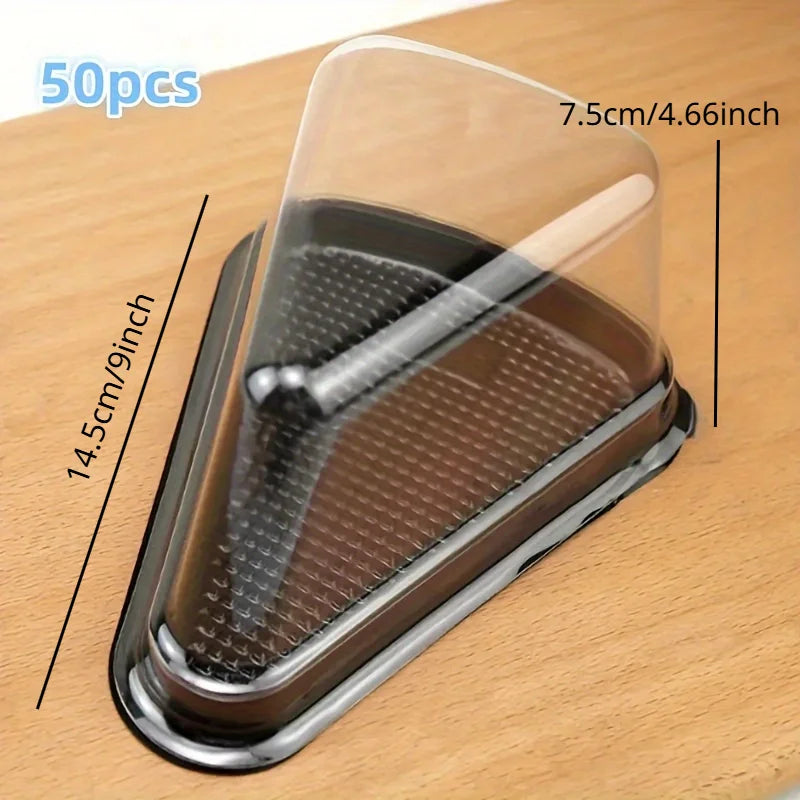 A clear disposable plastic cake slice container with a textured silicone insert resting on a wooden surface.